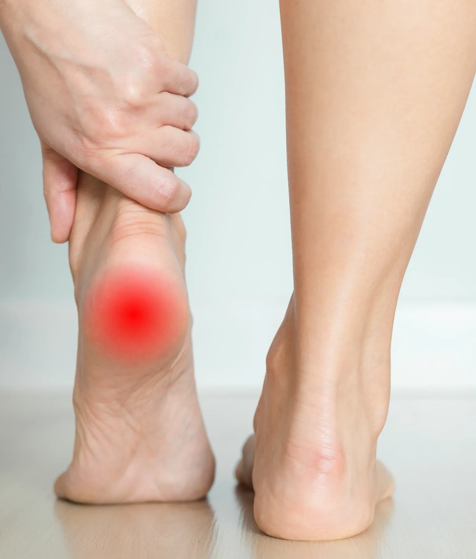 The arch and inner heel, where plantar fasciitis pain is typically felt